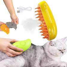 Cat Steamy Brush pettine per massaggio per cani Spray elettrico incorporato in Silicone morbido per la depilazione degli animali domestici spazzola per toelettatura accessori per gatti